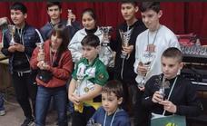 Alexander Sánchez, Nicolás Cruces, Sheila y Cristian Chura, ganadores del 'Francisco Bernardos' de ajedrez