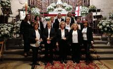 Numerosos malpartideños asistieron a la misa cantada por el coro de las Amas de Casa 'Los Barruecos' a la Virgen de la Montaña