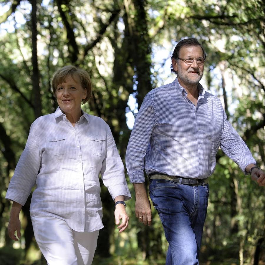 Rajoy y Merkel recorren el Camino de Santiago