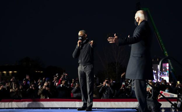 Barack Obama y Joe Biden, en un mitin./Afp