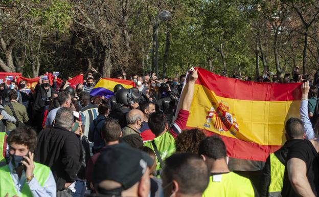 Detenidos dos miembros de seguridad de Podemos por los incidentes de Vallecas