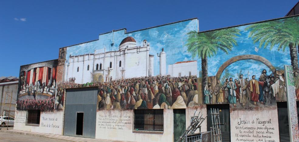 Un mural de 320 metros cuadrados sobre la Pasión Viviente da la bienvenida a los visitantes en Oliva de la Frontera - Vimarsana News