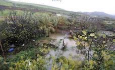 Las lluvias desbordan el cauce de la Ribera e inundan las huertas del Marco en Cáceres