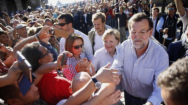 Rajoy y Merkel, un interés mutuo