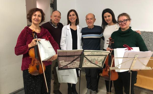 La AECC de Zafra sorprende a los pacientes oncológicos y sus familias con un concierto navideño